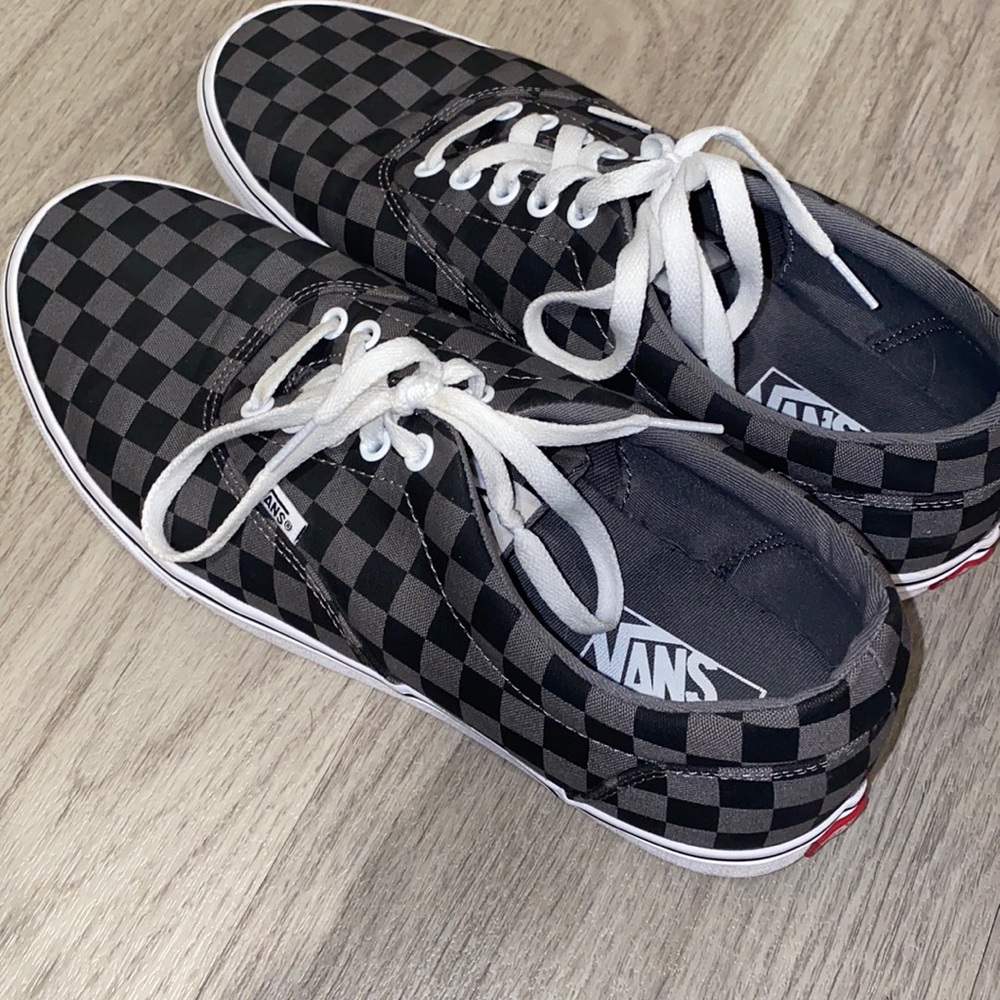 Black and gray checkered vans
